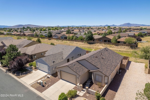 drone / aerial view featuring a mountain view