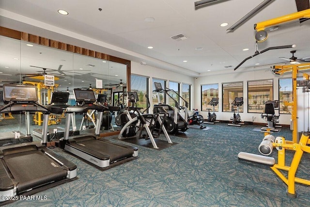 exercise room featuring visible vents, recessed lighting, and ceiling fan