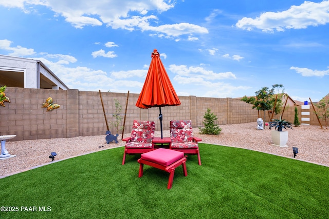 view of yard featuring a fenced backyard