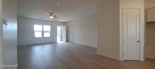 2535 Dillon Blvd, Chino Valley, AZ 86323 - spare room with ceiling fan, wood finished floors, and baseboards