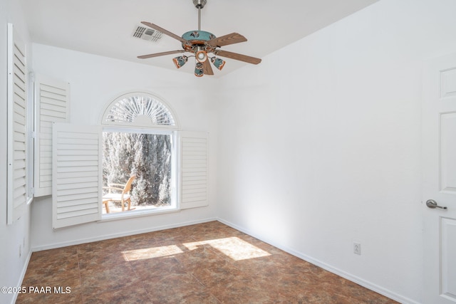 spare room featuring ceiling fan