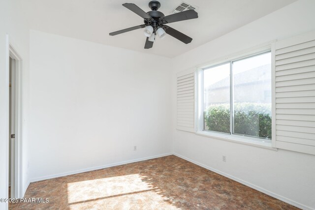 unfurnished room featuring ceiling fan