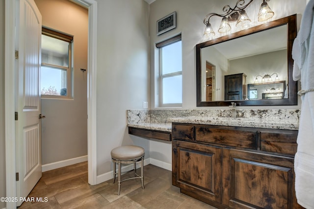 9150 N Whitney Way, Prescott Valley, AZ 86315 - bathroom with vanity and baseboards