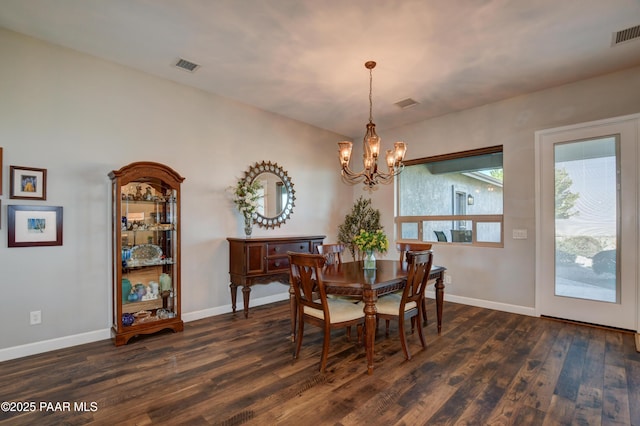 9150 N Whitney Way, Prescott Valley, AZ 86315 - dining space with a chandelier, dark wood-style floors, and baseboards