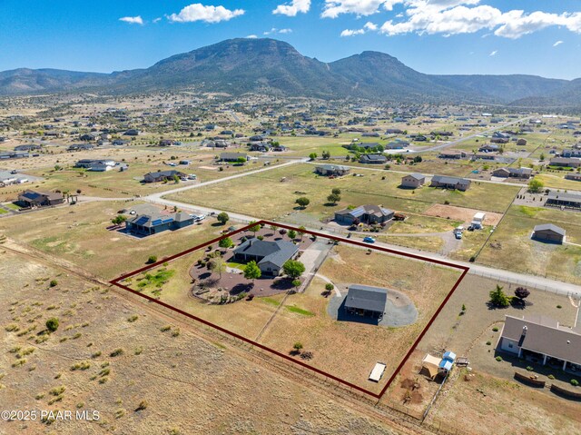 9150 N Whitney Way, Prescott Valley, AZ 86315 - aerial overview of property's location with property boundaries highlighted and a mountain backdrop