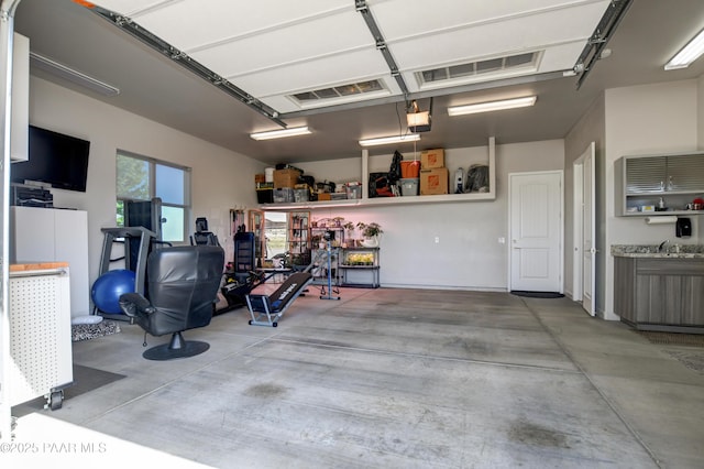 9150 N Whitney Way, Prescott Valley, AZ 86315 - garage featuring a garage door opener
