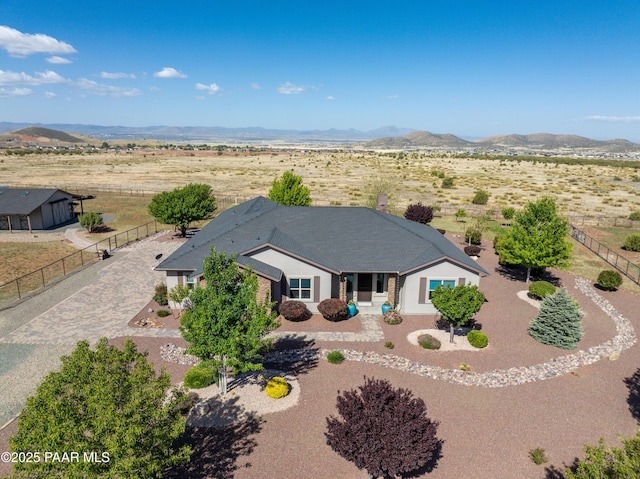 9150 N Whitney Way, Prescott Valley, AZ 86315 - view of front of home featuring a mountain view, fence, a view of countryside, and driveway