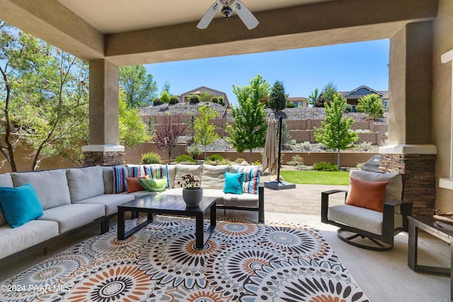 view of patio featuring outdoor lounge area and ceiling fan