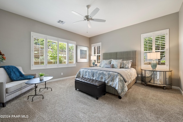 bedroom featuring ceiling fan and carpet floors