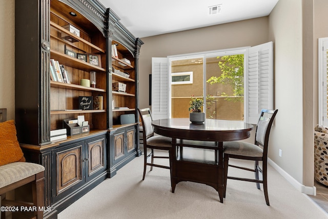 view of carpeted dining room