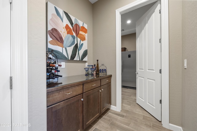 hall featuring light wood-type flooring