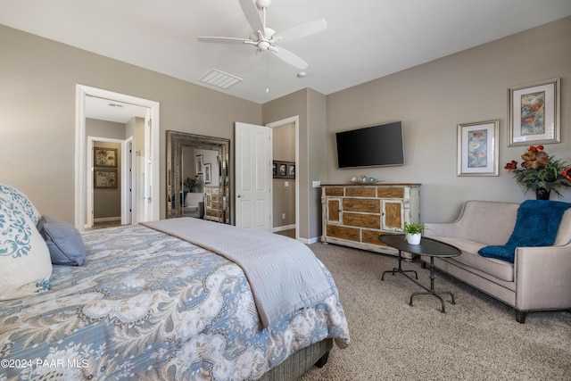 bedroom with ceiling fan and carpet floors