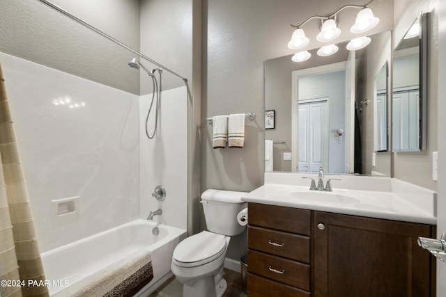 full bathroom with vanity, toilet, and shower / tub combo with curtain