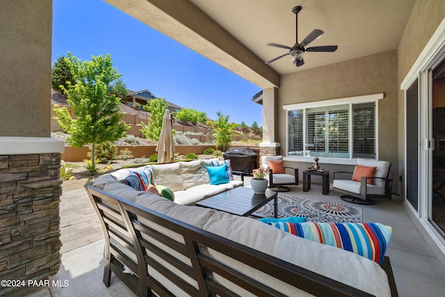 view of patio / terrace featuring an outdoor living space, ceiling fan, and a grill