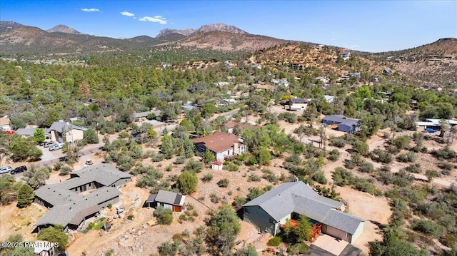 2403 Country Park Dr, Prescott, AZ 86305 - aerial overview of property's location with a mountain backdrop and nearby suburban area