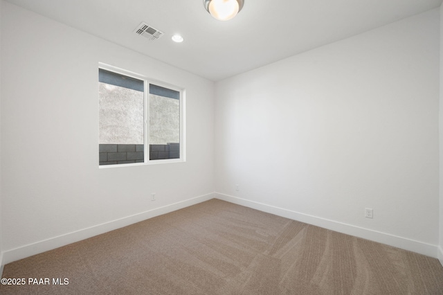 view of carpeted spare room