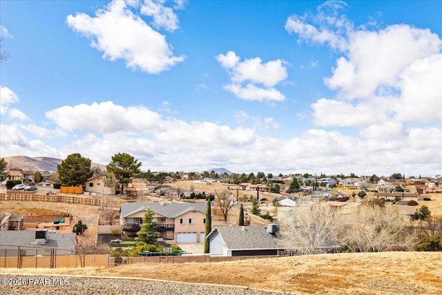 exterior space featuring a mountain view and a residential view