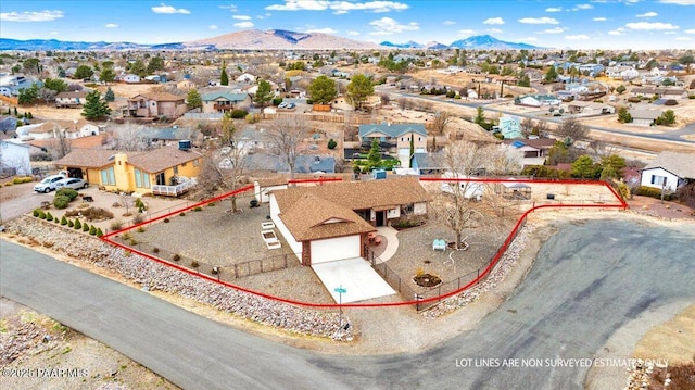 aerial view featuring a residential view and a mountain view