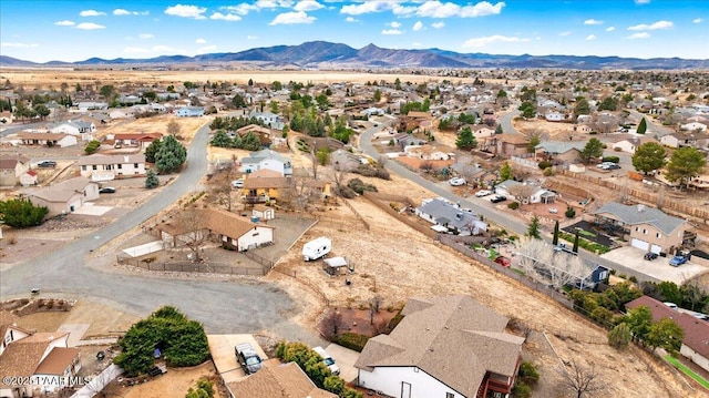 bird's eye view with a mountain view, a desert view, and a residential view