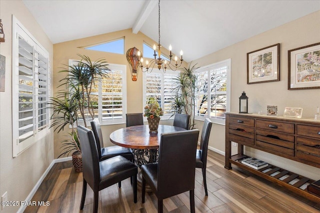 dining room with lofted ceiling with beams, dark hardwood / wood-style flooring, and a chandelier