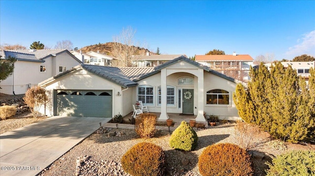 view of front of property with a garage