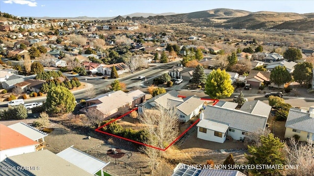 drone / aerial view featuring a mountain view