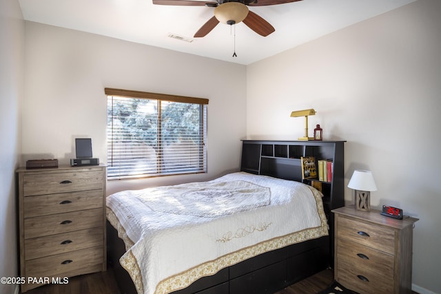 5882 N Gallery Ln, Prescott Valley, AZ 86314 - bedroom with dark wood-type flooring and ceiling fan