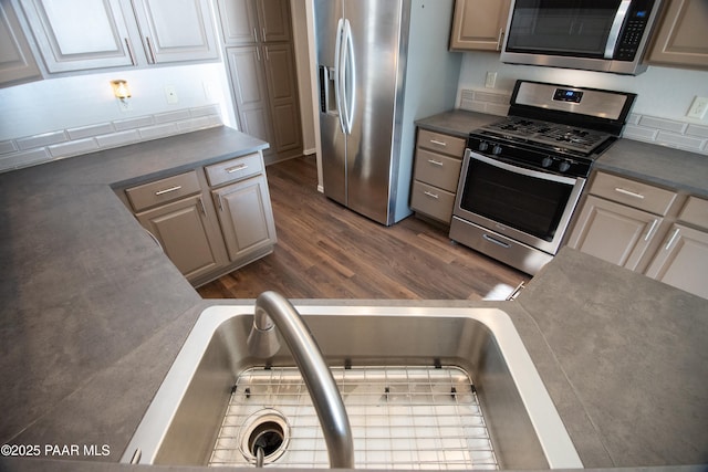 5882 N Gallery Ln, Prescott Valley, AZ 86314 - kitchen featuring appliances with stainless steel finishes and dark hardwood / wood-style flooring