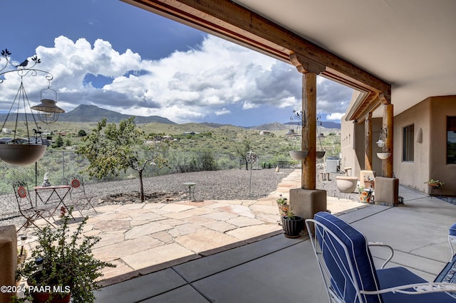 view of patio with a mountain view