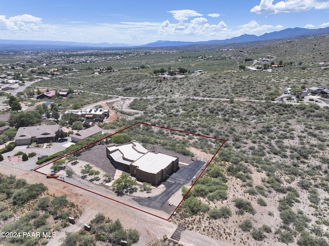 overview of rural landscape featuring property boundaries highlighted and a mountainous background