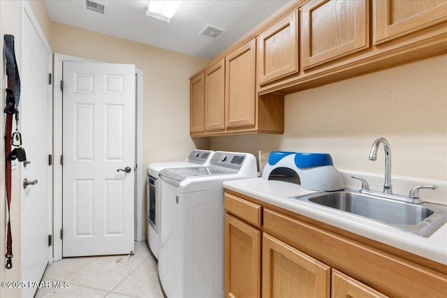 1915 N Bittersweet Way, Prescott Valley, AZ 86314 - laundry area featuring separate washer and dryer, cabinet space, and light tile patterned floors