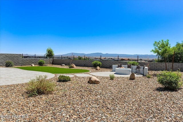 4947 Mclaury Dr, Prescott Valley, AZ 86314 - fenced backyard featuring a patio and a mountain view
