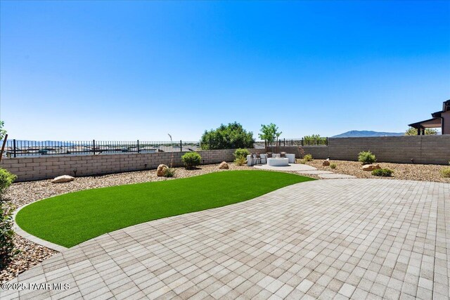 4947 Mclaury Dr, Prescott Valley, AZ 86314 - fenced backyard with a patio area