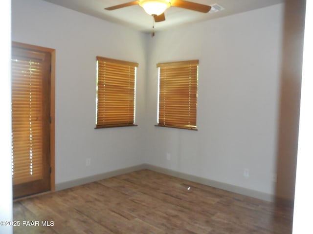 3575 N Meadowlark Dr, Prescott Valley, AZ 86314 - unfurnished room featuring a ceiling fan, wood finished floors, and baseboards