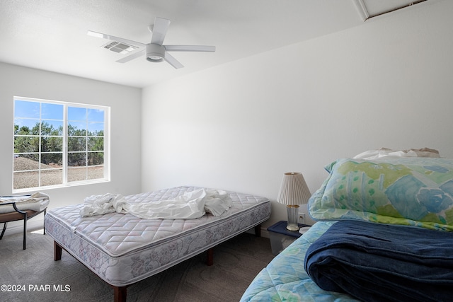 carpeted bedroom with ceiling fan