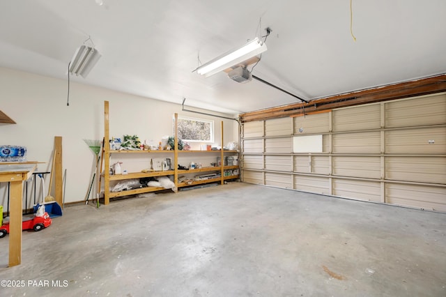 garage featuring a garage door opener