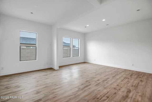 3263 Iron King Cir, Prescott, AZ 86301 - spare room featuring light wood finished floors, healthy amount of natural light, recessed lighting, and baseboards