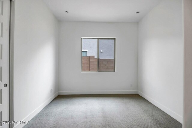 3263 Iron King Cir, Prescott, AZ 86301 - spare room with carpet flooring and baseboards