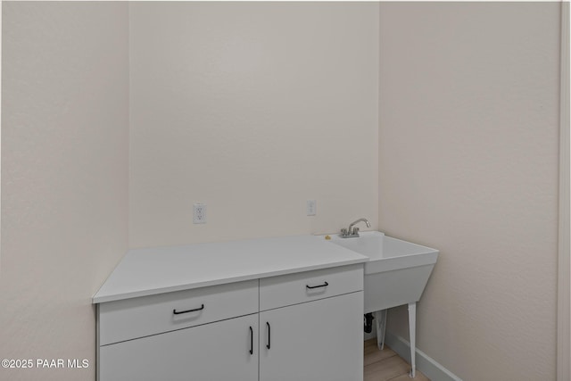 bathroom featuring baseboards