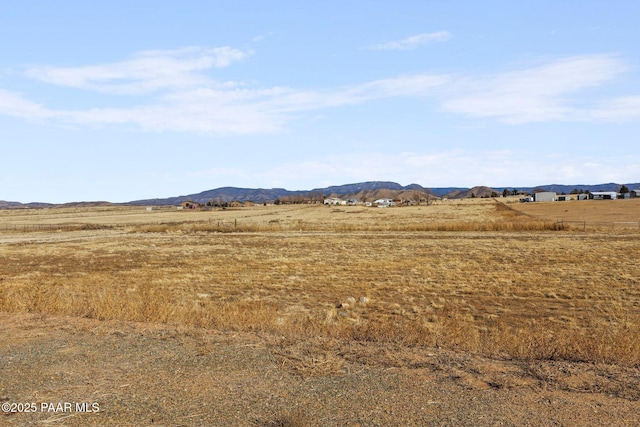 property view of mountains featuring a rural view