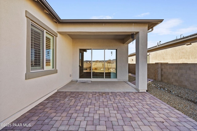 view of patio / terrace with fence