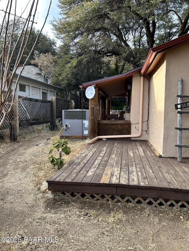 deck with central air condition unit