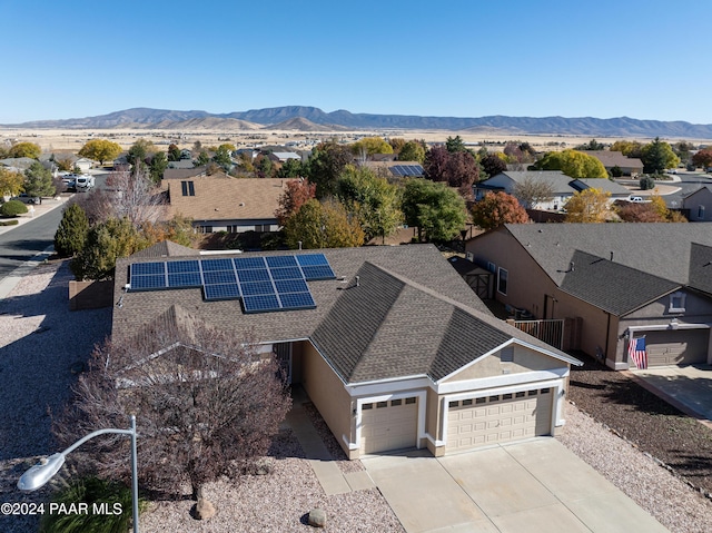 drone / aerial view featuring a mountain view