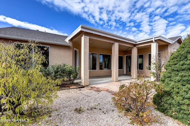 rear view of house with a patio area