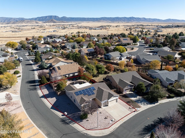 drone / aerial view featuring a mountain view