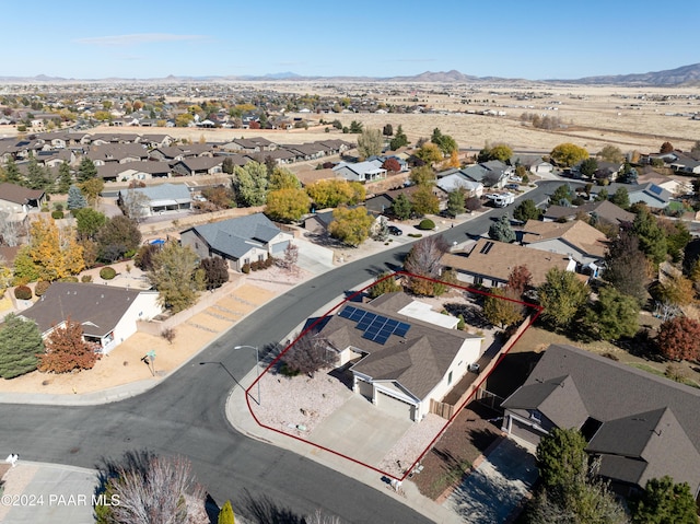 birds eye view of property featuring a mountain view