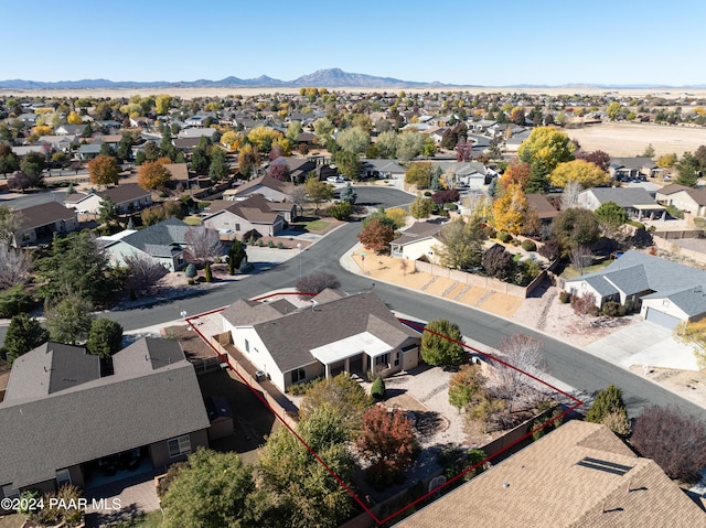 drone / aerial view featuring a mountain view