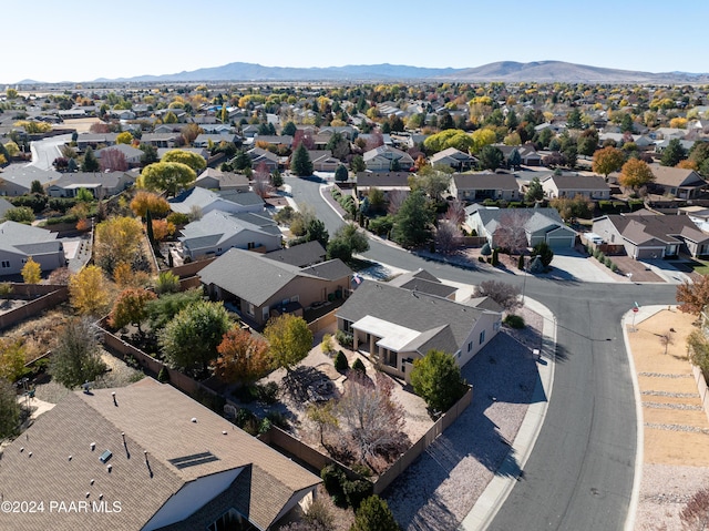 birds eye view of property with a mountain view