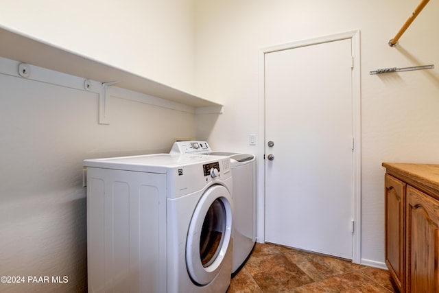 laundry area featuring washing machine and dryer