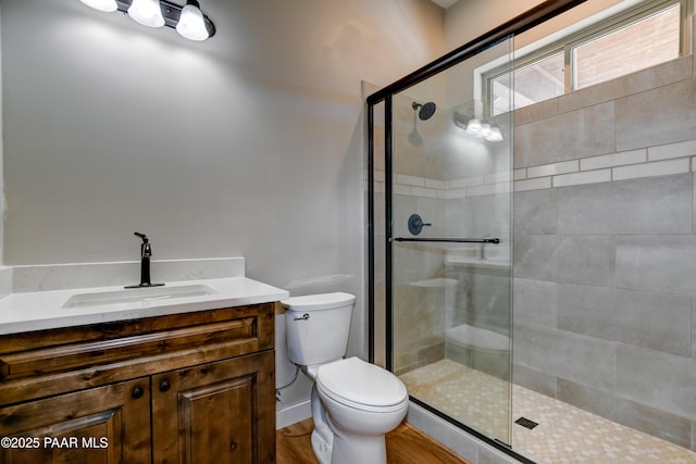 14320 E Casa Serena Way, Prescott Valley, AZ 86315 - full bathroom featuring a shower stall, toilet, vanity, and wood finished floors